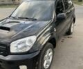 Черный Тойота РАВ 4, объемом двигателя 1.99 л и пробегом 250 тыс. км за 4800 $, фото 1 на Automoto.ua
