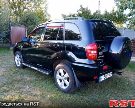 Чорний Тойота РАВ 4, об'ємом двигуна 2 л та пробігом 251 тис. км за 7100 $, фото 1 на Automoto.ua