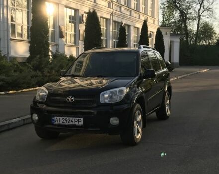 Чорний Тойота РАВ 4, об'ємом двигуна 2 л та пробігом 287 тис. км за 6950 $, фото 1 на Automoto.ua