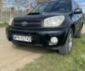 Черный Тойота РАВ 4, объемом двигателя 2 л и пробегом 303 тыс. км за 4500 $, фото 1 на Automoto.ua