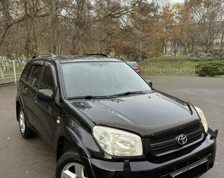 Черный Тойота РАВ 4, объемом двигателя 2 л и пробегом 230 тыс. км за 6500 $, фото 1 на Automoto.ua