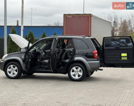Черный Тойота РАВ 4, объемом двигателя 2 л и пробегом 230 тыс. км за 7850 $, фото 21 на Automoto.ua