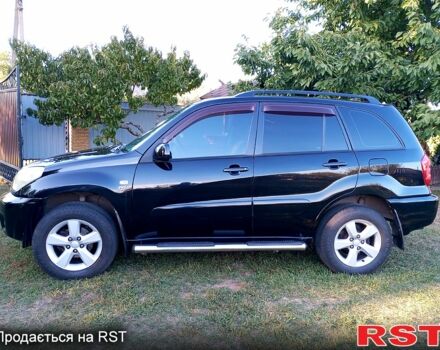 Чорний Тойота РАВ 4, об'ємом двигуна 2 л та пробігом 251 тис. км за 7100 $, фото 2 на Automoto.ua