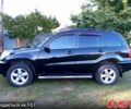 Чорний Тойота РАВ 4, об'ємом двигуна 2 л та пробігом 251 тис. км за 7100 $, фото 2 на Automoto.ua
