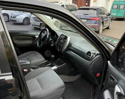 Черный Тойота РАВ 4, объемом двигателя 2 л и пробегом 230 тыс. км за 6500 $, фото 9 на Automoto.ua