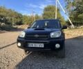 Чорний Тойота РАВ 4, об'ємом двигуна 2 л та пробігом 347 тис. км за 4800 $, фото 1 на Automoto.ua