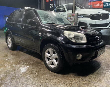 Черный Тойота РАВ 4, объемом двигателя 2 л и пробегом 269 тыс. км за 7500 $, фото 3 на Automoto.ua