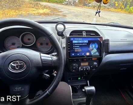 Черный Тойота РАВ 4, объемом двигателя 2 л и пробегом 224 тыс. км за 9000 $, фото 2 на Automoto.ua