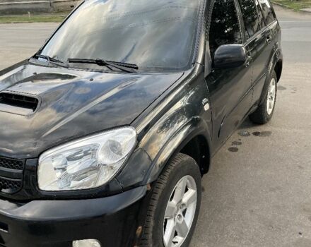 Чорний Тойота РАВ 4, об'ємом двигуна 2 л та пробігом 250 тис. км за 4800 $, фото 1 на Automoto.ua