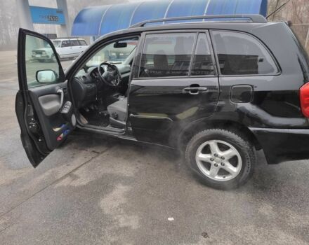 Черный Тойота РАВ 4, объемом двигателя 2 л и пробегом 275 тыс. км за 4800 $, фото 1 на Automoto.ua