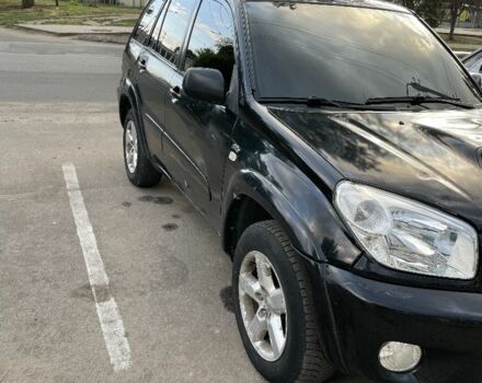 Чорний Тойота РАВ 4, об'ємом двигуна 2 л та пробігом 250 тис. км за 4800 $, фото 5 на Automoto.ua