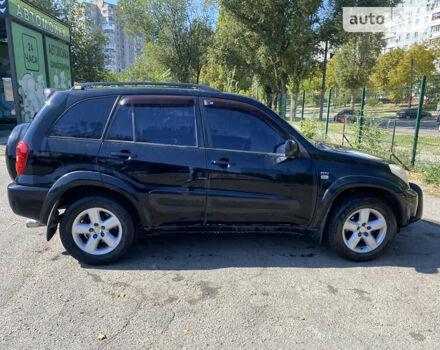 Черный Тойота РАВ 4, объемом двигателя 2 л и пробегом 262 тыс. км за 8800 $, фото 2 на Automoto.ua
