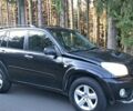 Чорний Тойота РАВ 4, об'ємом двигуна 2 л та пробігом 320 тис. км за 4211 $, фото 1 на Automoto.ua