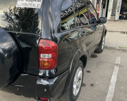 Чорний Тойота РАВ 4, об'ємом двигуна 2 л та пробігом 250 тис. км за 4800 $, фото 6 на Automoto.ua