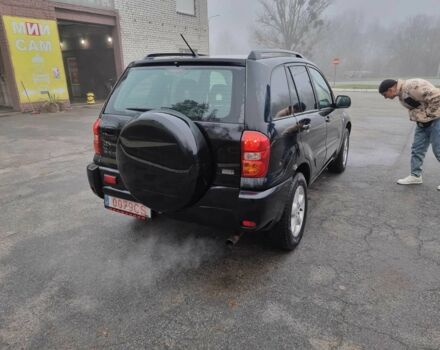 Черный Тойота РАВ 4, объемом двигателя 2 л и пробегом 275 тыс. км за 4800 $, фото 3 на Automoto.ua