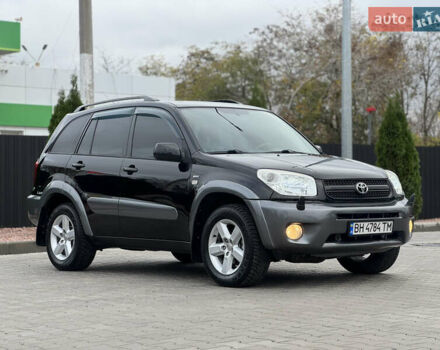 Черный Тойота РАВ 4, объемом двигателя 2 л и пробегом 230 тыс. км за 7850 $, фото 3 на Automoto.ua