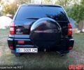 Чорний Тойота РАВ 4, об'ємом двигуна 2 л та пробігом 251 тис. км за 7100 $, фото 1 на Automoto.ua
