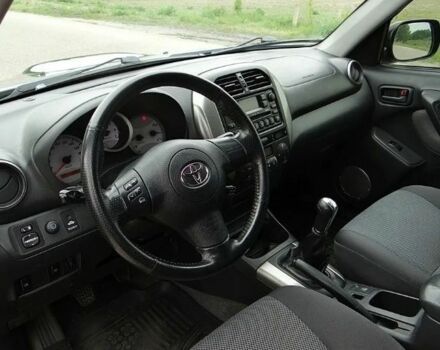 Черный Тойота РАВ 4, объемом двигателя 2 л и пробегом 210 тыс. км за 2600 $, фото 6 на Automoto.ua