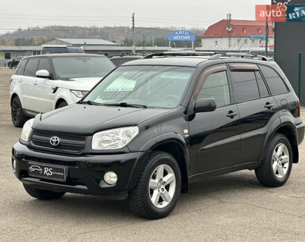 Черный Тойота РАВ 4, объемом двигателя 2 л и пробегом 243 тыс. км за 6900 $, фото 5 на Automoto.ua