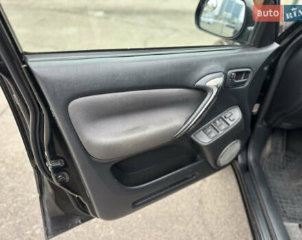 Черный Тойота РАВ 4, объемом двигателя 2 л и пробегом 243 тыс. км за 6900 $, фото 7 на Automoto.ua