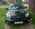 Чорний Тойота РАВ 4, об'ємом двигуна 2 л та пробігом 351 тис. км за 4100 $, фото 2 на Automoto.ua