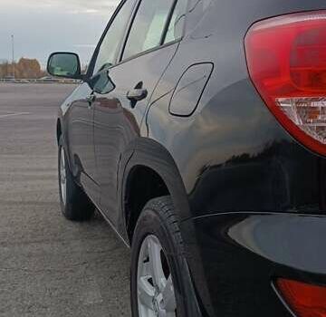 Черный Тойота РАВ 4, объемом двигателя 2 л и пробегом 202 тыс. км за 8066 $, фото 6 на Automoto.ua