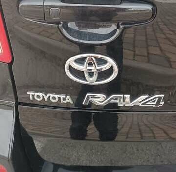 Черный Тойота РАВ 4, объемом двигателя 2 л и пробегом 202 тыс. км за 8066 $, фото 7 на Automoto.ua