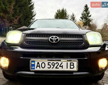 Черный Тойота РАВ 4, объемом двигателя 2 л и пробегом 199 тыс. км за 6999 $, фото 25 на Automoto.ua