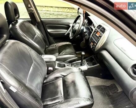 Черный Тойота РАВ 4, объемом двигателя 2 л и пробегом 199 тыс. км за 6999 $, фото 7 на Automoto.ua