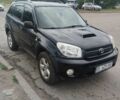 Чорний Тойота РАВ 4, об'ємом двигуна 2 л та пробігом 195 тис. км за 5582 $, фото 1 на Automoto.ua