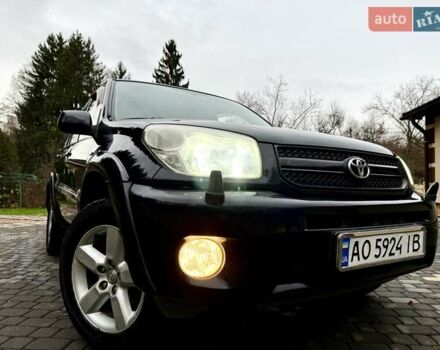 Черный Тойота РАВ 4, объемом двигателя 2 л и пробегом 199 тыс. км за 6999 $, фото 91 на Automoto.ua