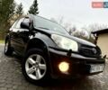Черный Тойота РАВ 4, объемом двигателя 2 л и пробегом 199 тыс. км за 6999 $, фото 1 на Automoto.ua