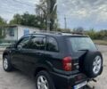Черный Тойота РАВ 4, объемом двигателя 2 л и пробегом 300 тыс. км за 6000 $, фото 2 на Automoto.ua