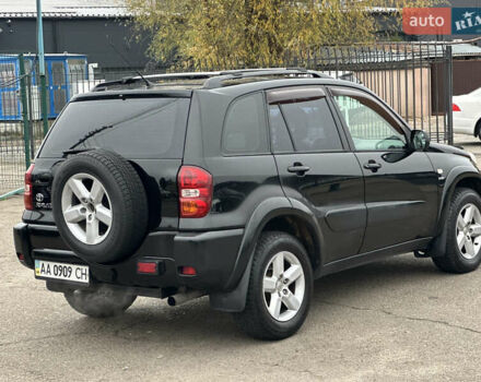 Черный Тойота РАВ 4, объемом двигателя 2 л и пробегом 243 тыс. км за 6900 $, фото 2 на Automoto.ua