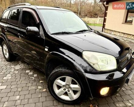 Черный Тойота РАВ 4, объемом двигателя 2 л и пробегом 199 тыс. км за 6999 $, фото 84 на Automoto.ua