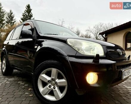 Черный Тойота РАВ 4, объемом двигателя 2 л и пробегом 199 тыс. км за 6999 $, фото 89 на Automoto.ua