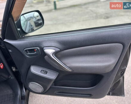 Черный Тойота РАВ 4, объемом двигателя 2 л и пробегом 243 тыс. км за 6900 $, фото 16 на Automoto.ua