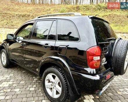 Черный Тойота РАВ 4, объемом двигателя 2 л и пробегом 199 тыс. км за 6999 $, фото 56 на Automoto.ua