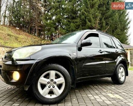 Черный Тойота РАВ 4, объемом двигателя 2 л и пробегом 199 тыс. км за 6999 $, фото 79 на Automoto.ua