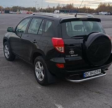 Черный Тойота РАВ 4, объемом двигателя 2 л и пробегом 202 тыс. км за 8066 $, фото 3 на Automoto.ua