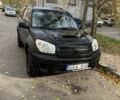 Черный Тойота РАВ 4, объемом двигателя 2 л и пробегом 300 тыс. км за 3600 $, фото 1 на Automoto.ua