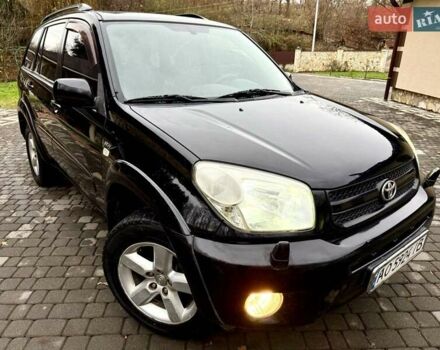 Черный Тойота РАВ 4, объемом двигателя 2 л и пробегом 199 тыс. км за 6999 $, фото 87 на Automoto.ua
