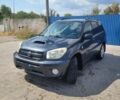 Черный Тойота РАВ 4, объемом двигателя 2 л и пробегом 320 тыс. км за 4500 $, фото 1 на Automoto.ua