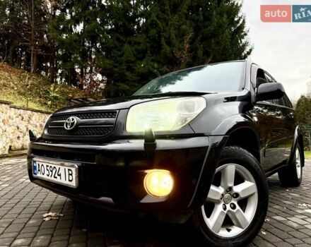 Черный Тойота РАВ 4, объемом двигателя 2 л и пробегом 199 тыс. км за 6999 $, фото 77 на Automoto.ua