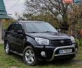 Черный Тойота РАВ 4, объемом двигателя 2 л и пробегом 186 тыс. км за 9500 $, фото 1 на Automoto.ua