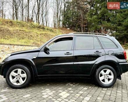 Черный Тойота РАВ 4, объемом двигателя 2 л и пробегом 199 тыс. км за 6999 $, фото 69 на Automoto.ua