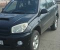 Черный Тойота РАВ 4, объемом двигателя 2 л и пробегом 340 тыс. км за 2500 $, фото 1 на Automoto.ua