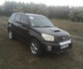 Чорний Тойота РАВ 4, об'ємом двигуна 2 л та пробігом 300 тис. км за 3500 $, фото 1 на Automoto.ua