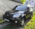 Черный Тойота РАВ 4, объемом двигателя 2 л и пробегом 320 тыс. км за 6550 $, фото 1 на Automoto.ua