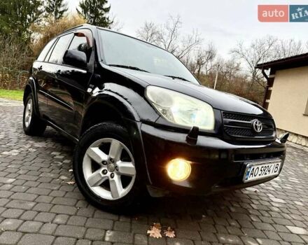 Черный Тойота РАВ 4, объемом двигателя 2 л и пробегом 199 тыс. км за 6999 $, фото 90 на Automoto.ua